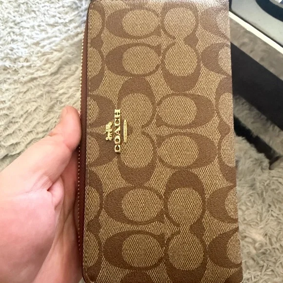 Coach Long Zip Around Wallet
In Signature Canvas - Picture 15 of 15
